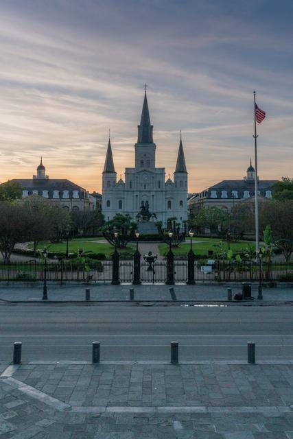 St. Louis Cathedral and Jackson Square glowing under an evening sky