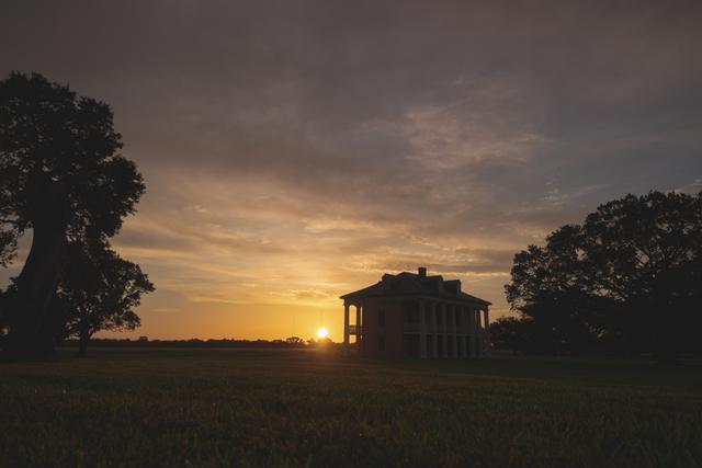 The historic Malus-Beauregard House at Chalmette Battlefield silhouetted at sunrise