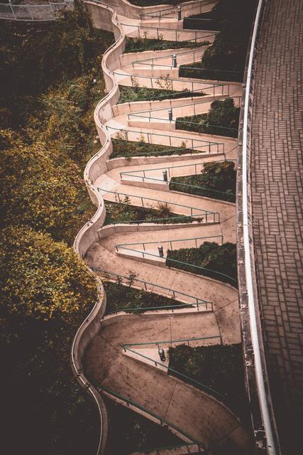 Looking down the switchback Riverwalk path that climbs the bluff to the Hunter Museum of American Art in Chattanooga, Tennessee, framed by autumn foliage